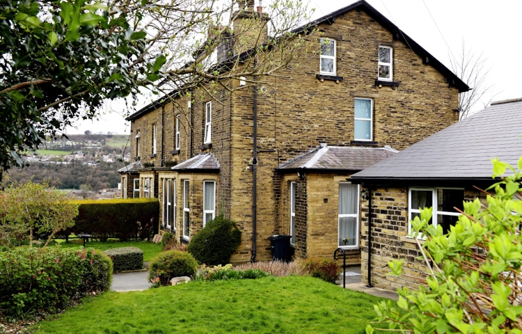 Wood View's gardens with trees and shrubs