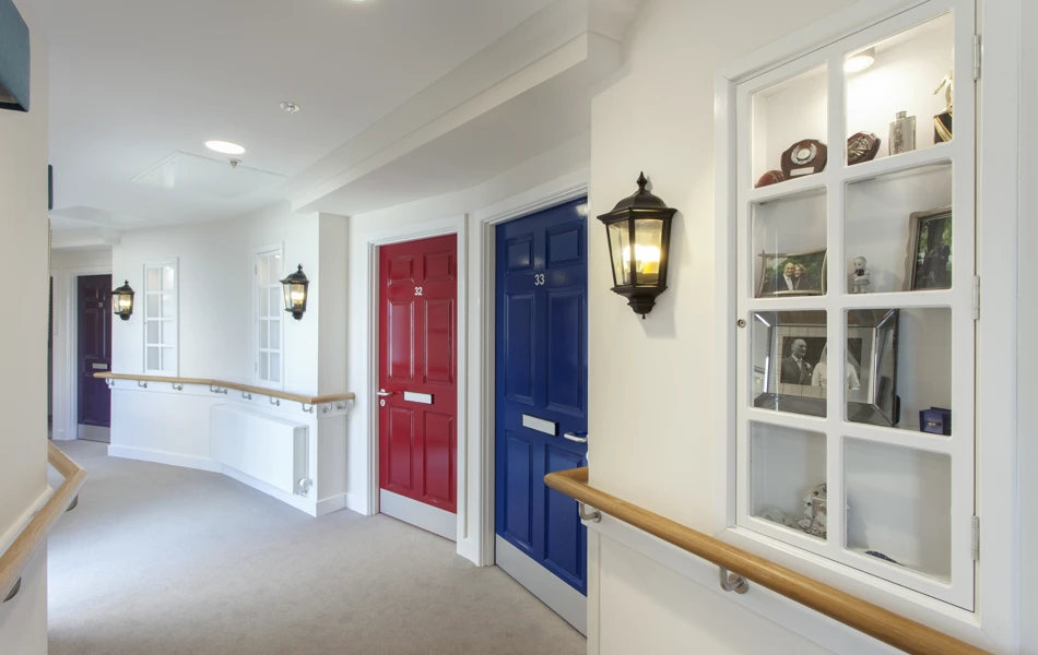 Each bedroom has a brightly coloured door complete with letterbox and street lamp