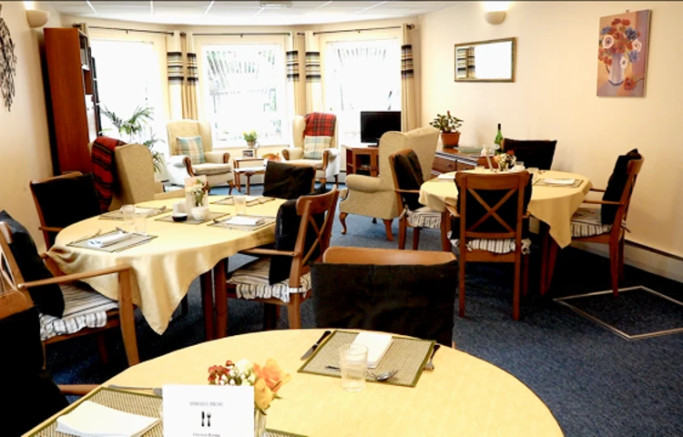 The dining area with tables set for dinner (1)