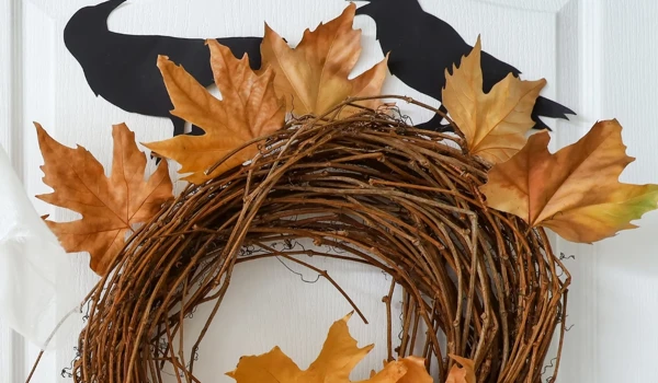 Halloween Wreath With Leaves And Cutout Bird