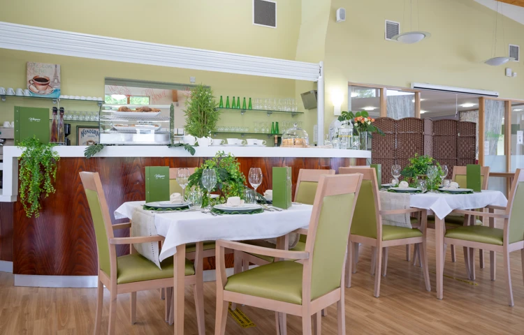 Dining tables and chairs in the restaurant at Girton Green Cambridge
