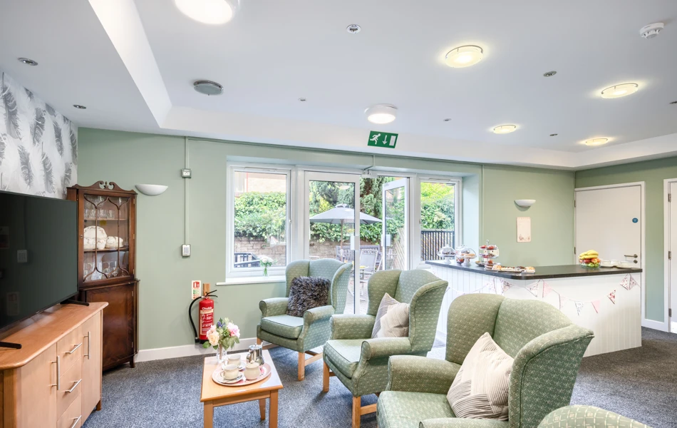 tv-area-and-kitchenette-at-sandwood-care-home.jpg