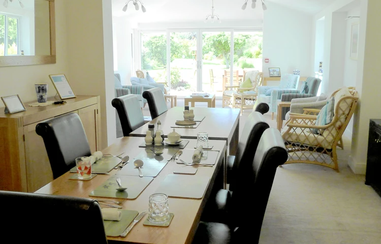 Communal dining room at Abbeyfield House where the residents come together to share meals