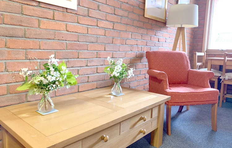 Seating area by the window at Garrad House