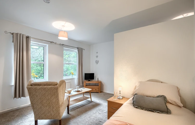 bedroom-and-lounge-area-at-abbeyfield-house.jpg