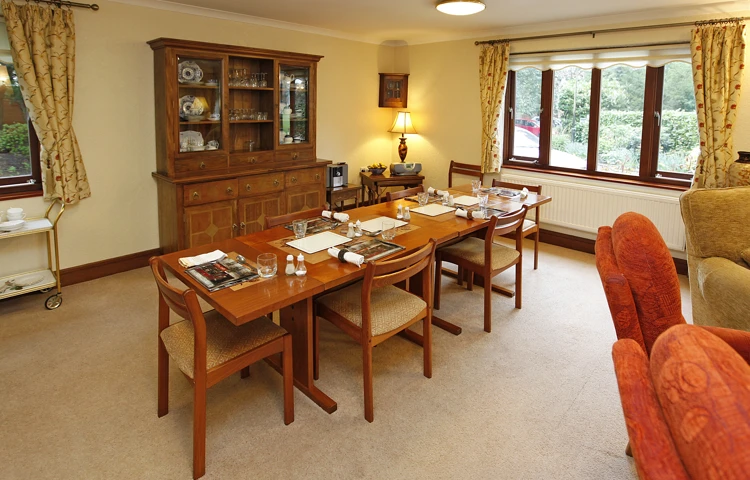 Long dining table set for dinner