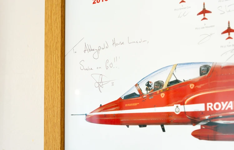signed-red-arrows-picture-gifted-to-residents-at-abbeyfield-house-lincoln.jpg