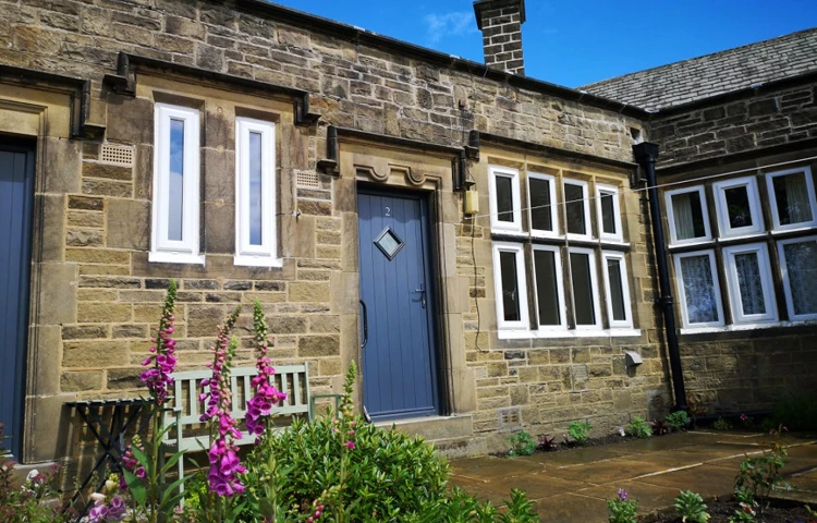 Front Exterior Of One Of The Charles Edward Sugden Cottages